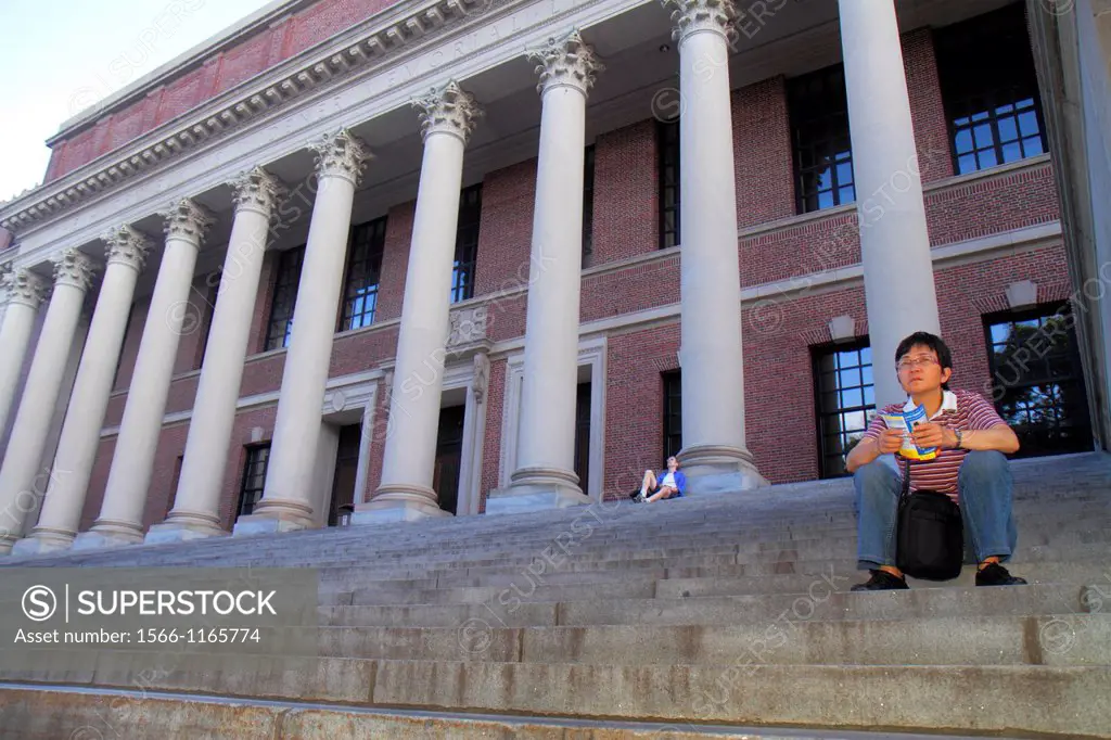 Massachusetts, Boston, Cambridge, Harvard University, campus, Asian, man, student, sitting, Widener Library, steps, front, entrance, columns,
