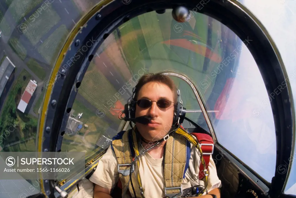 Inside view of pilot during aerobatic flight with Yak-52 Russian plane , Pirmasens aerodrome, Germany