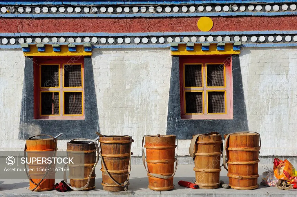 China, Qinghai, Amdo, Tongren Rebkong, Monastery of Gomar Guomari Si, Losar New Year festival, Butter tea buckets
