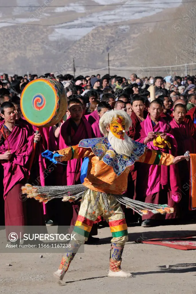 China, Gansu, Amdo, Xiahe, Monastery of Labrang Labuleng Si, Losar New Year festival, Masked Dance at the bottom of the giant Thangka