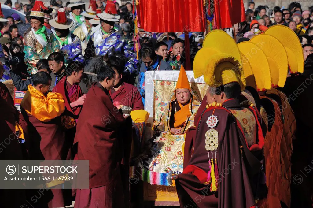 China, Gansu, Amdo, Xiahe, Monastery of Labrang Labuleng Si, Losar New Year festival, Jamyang Gyapa Rinpoche presiding the giant Thangka display