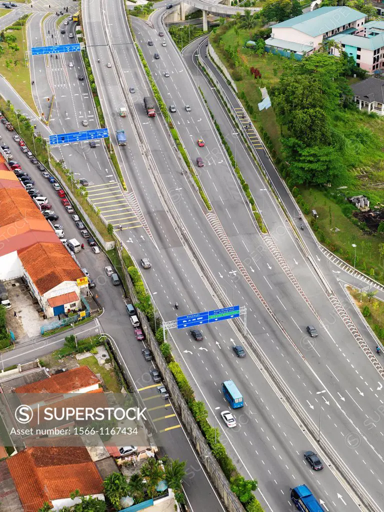 Cars and trucks on a highway in Johor