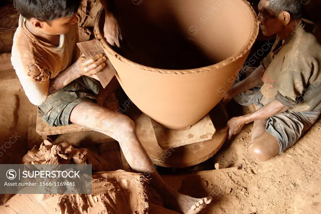 Nwe Nyein is a town of pottery  Almost all the inhabitants earn their living by making various designs of pot  Along the Irrawady river  Mandalay Divi...