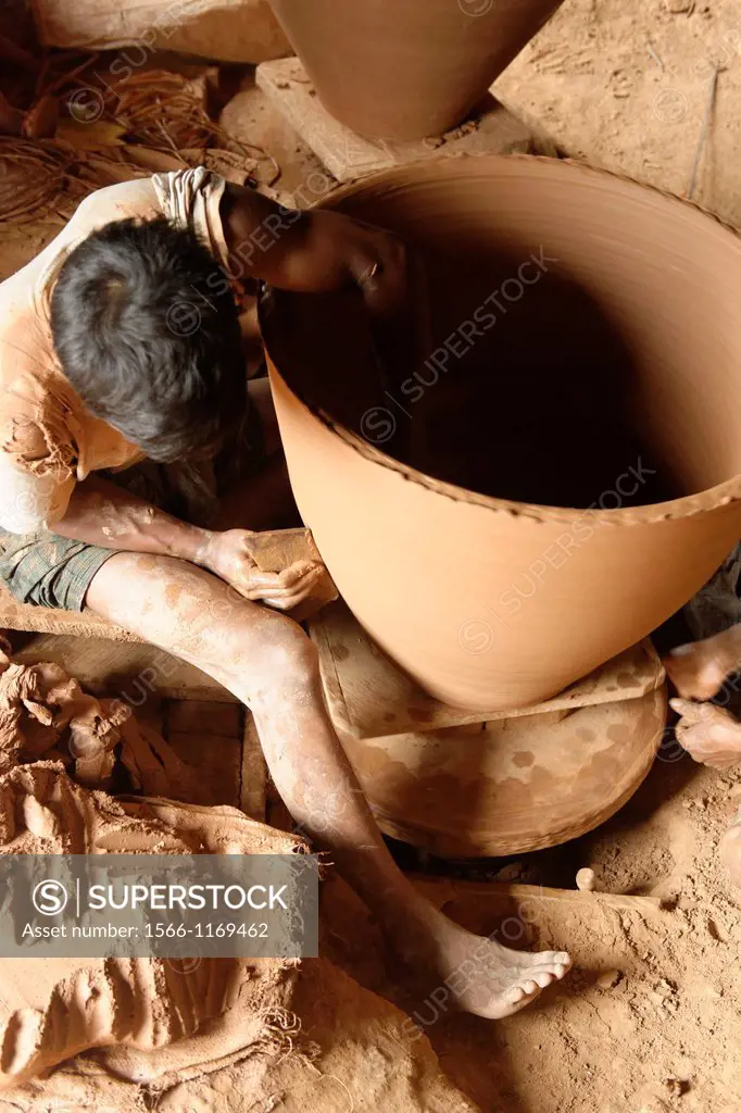Nwe Nyein is a town of pottery  Almost all the inhabitants earn their living by making various designs of pot  Along the Irrawady river  Mandalay Divi...