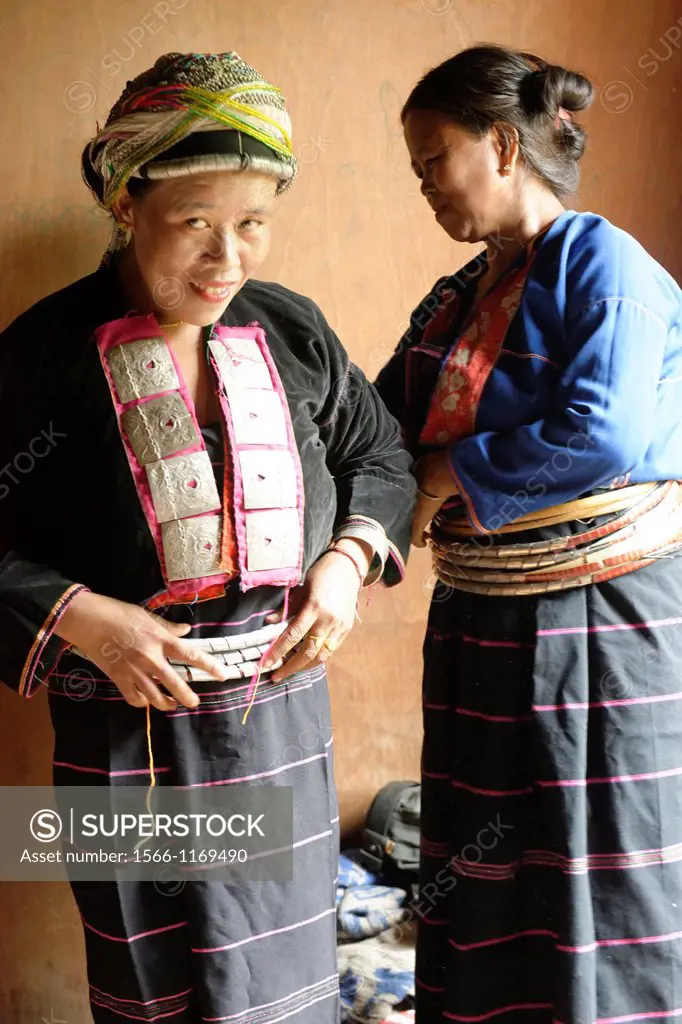 The women wear original costumes made of hoops and pearls because of the legend of nagi or Princess Snake  Palaung village  Palaung is a Mon-Khmer eth...