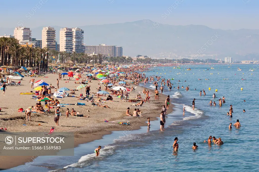 Torremolinos, Malaga Province, Costa del Sol, Spain  Crowded Bajondillo beach in high season