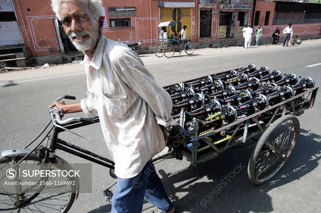 Man with rickshaw and sewing machines Jaipur Rajasthan India