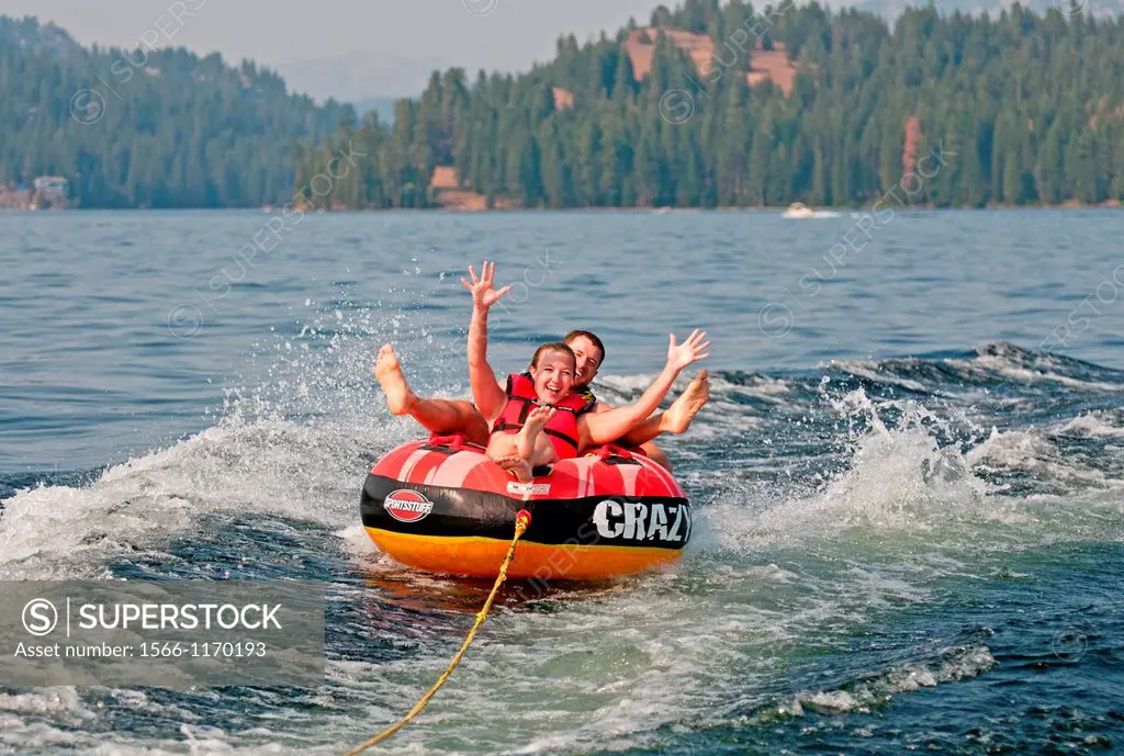 Riding the tube at Payette Lake near the city of McCall in central Idaho