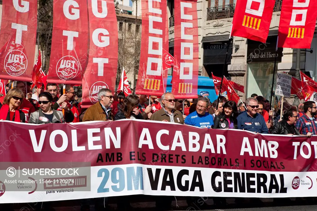 Trade unionists and workers march against government measures, at Valencia city, Spain