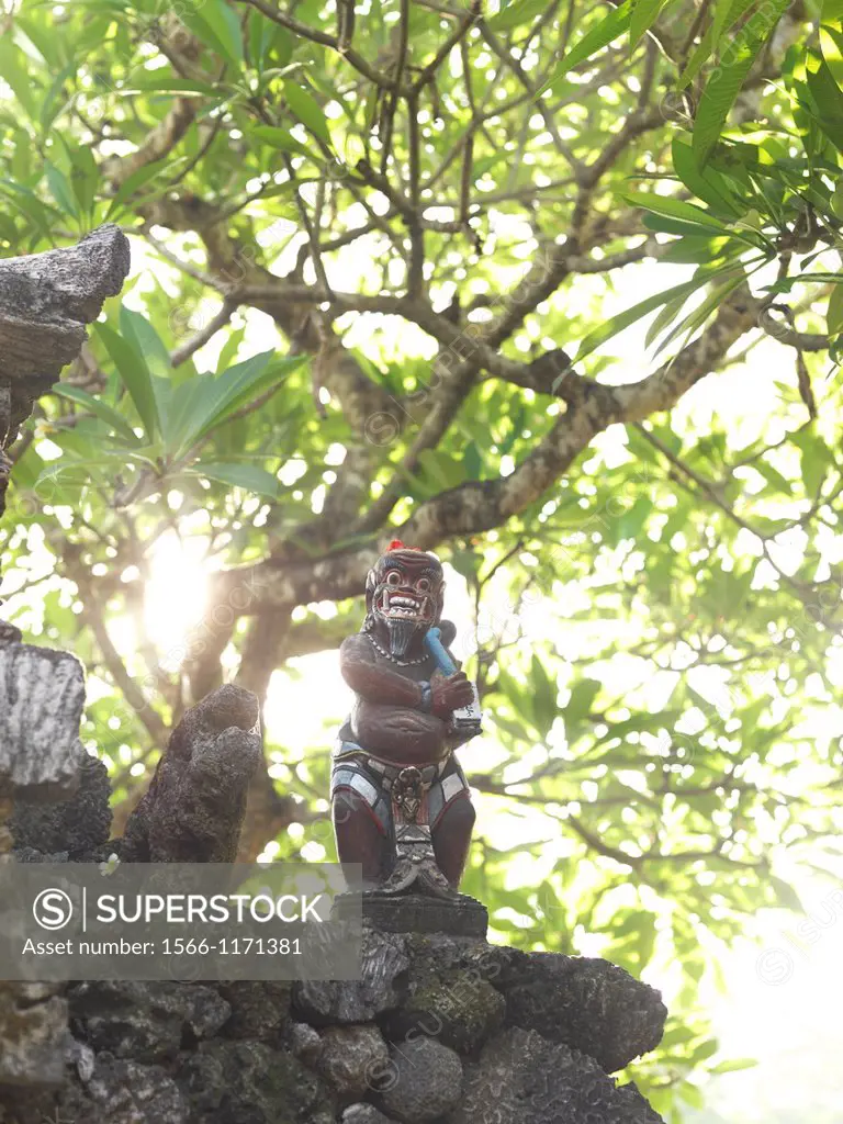 A Balinese monkey god statue at an altar