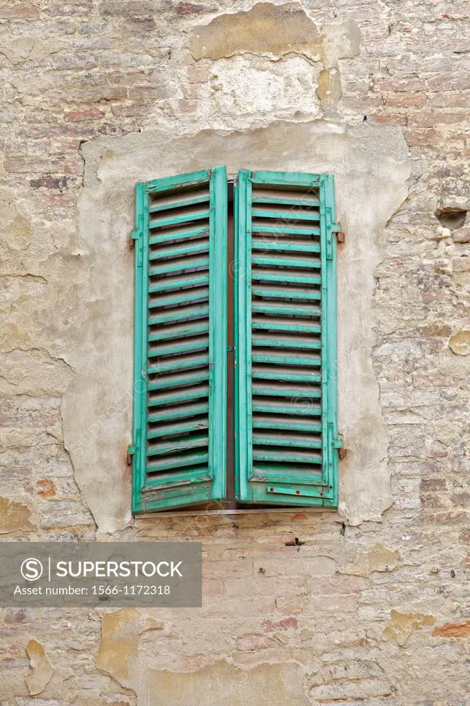Close Up of a Weathered Green Wood Window Shutter of Florence