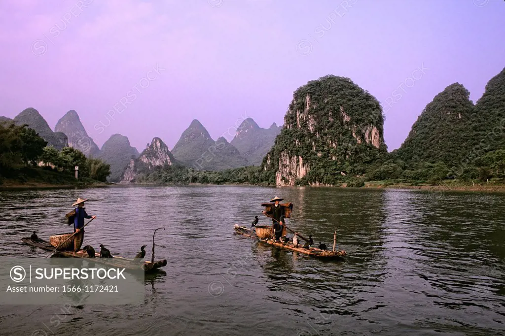 Colorful scenic of the bird fishermen on the Li River in Guilin China