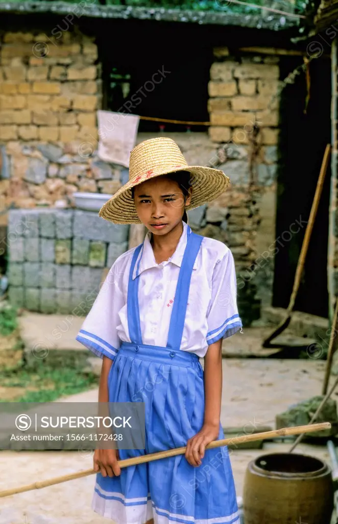 Portrait of poor girl at home in Guilin China