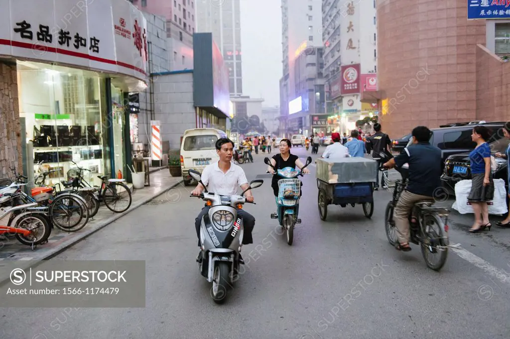 Police and locals commuting on bicycles in China