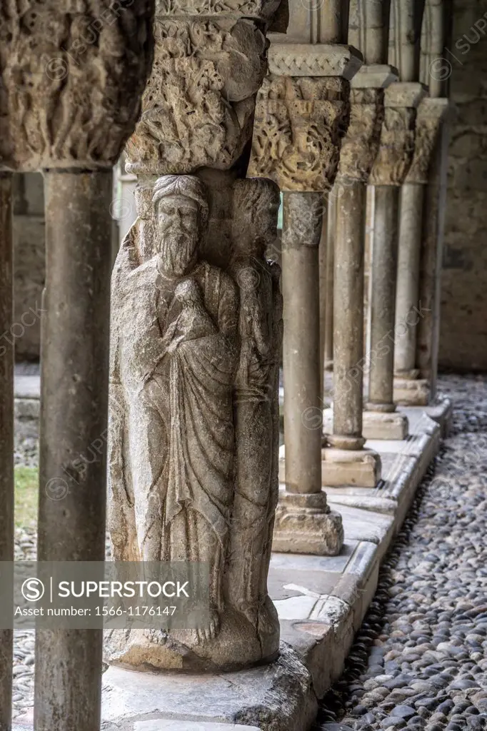 Column depicting Evangelists in western gallery of cloister of Cathedral Notre-Dame de Saint-Bertrand-de-Comminges. Hautes-Pyrénées, France.