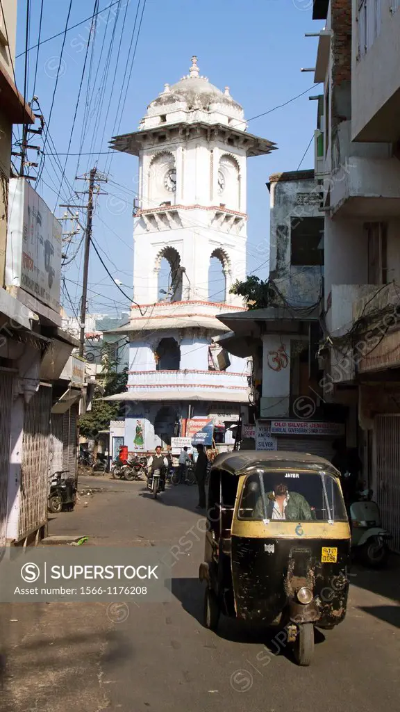 Auto rickshaw and clock tower Udaipur Rajasthan India