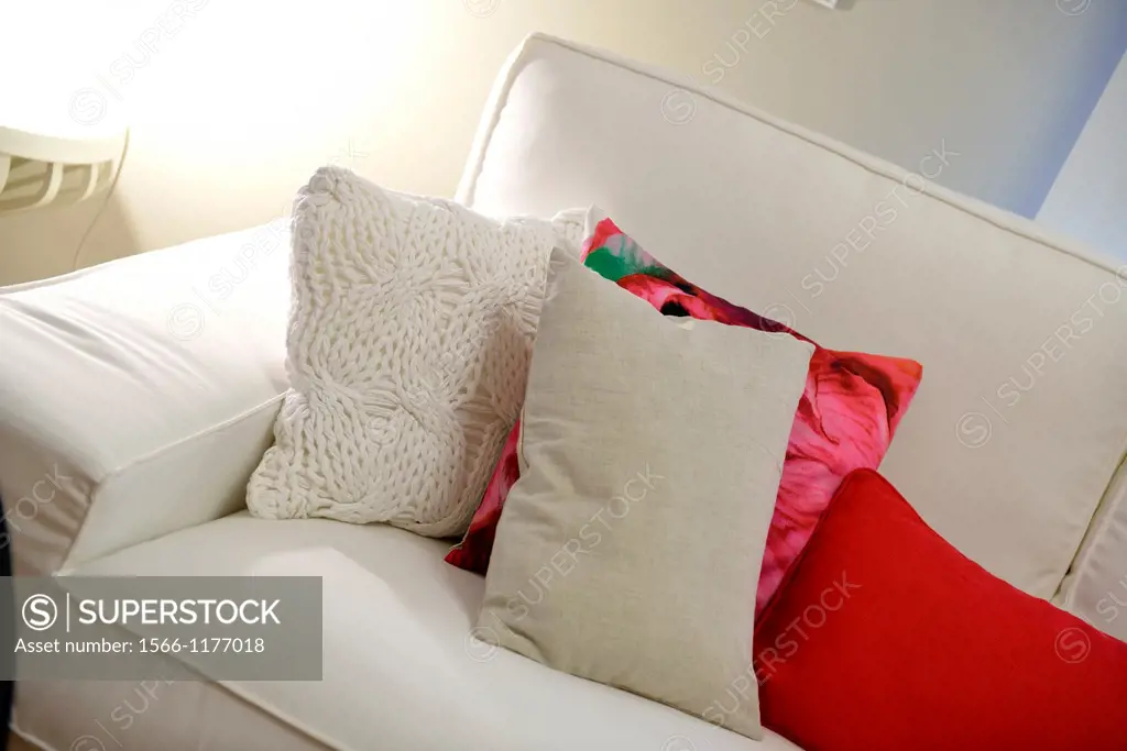 Couch with colorful cushions