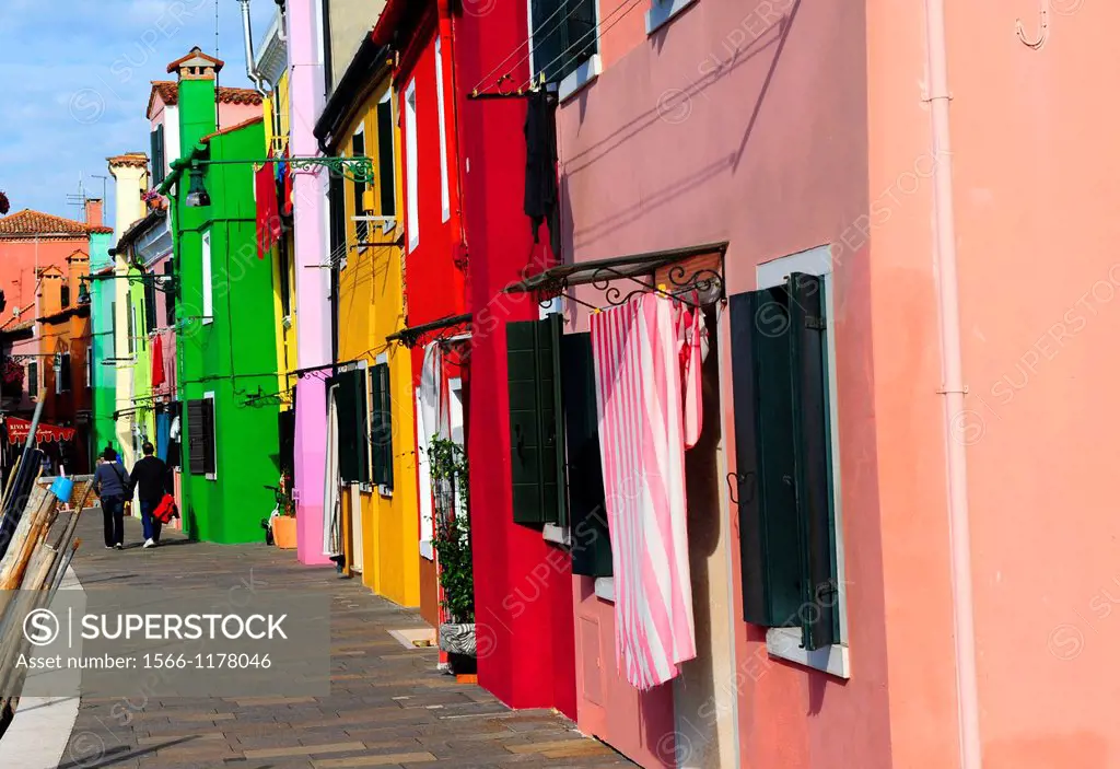 Colorful houses in a row beside Burano´s Grand Canal in the island of Burano near Venice,Italy,Europe