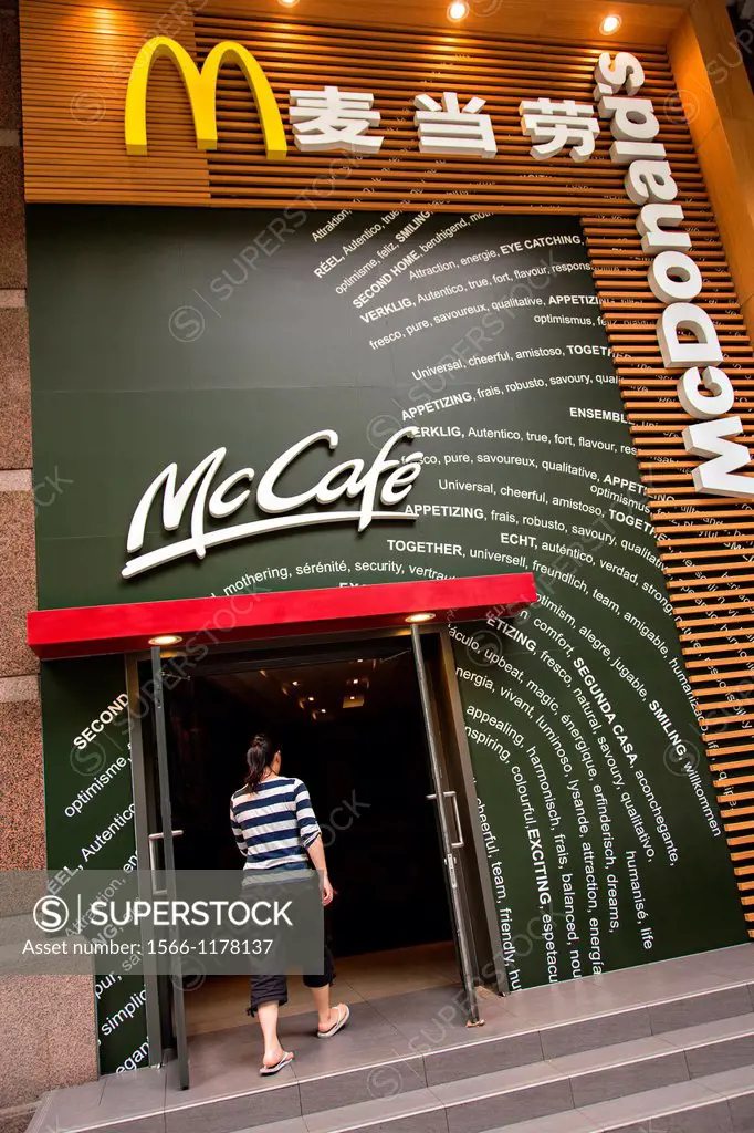 A Chinese customer enters McDonald´s McCafe in Shanghai, China
