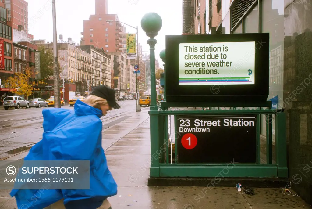 A sign informs travelers of the shutdown of the New York City subway system in the Chelsea neighborhood of New York Hurricane Sandy continues its stea...