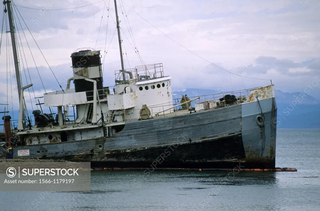 Wreck in front of the Ushuaia harbour, the southernmost city in the world, Patagonia, Argentina, South America