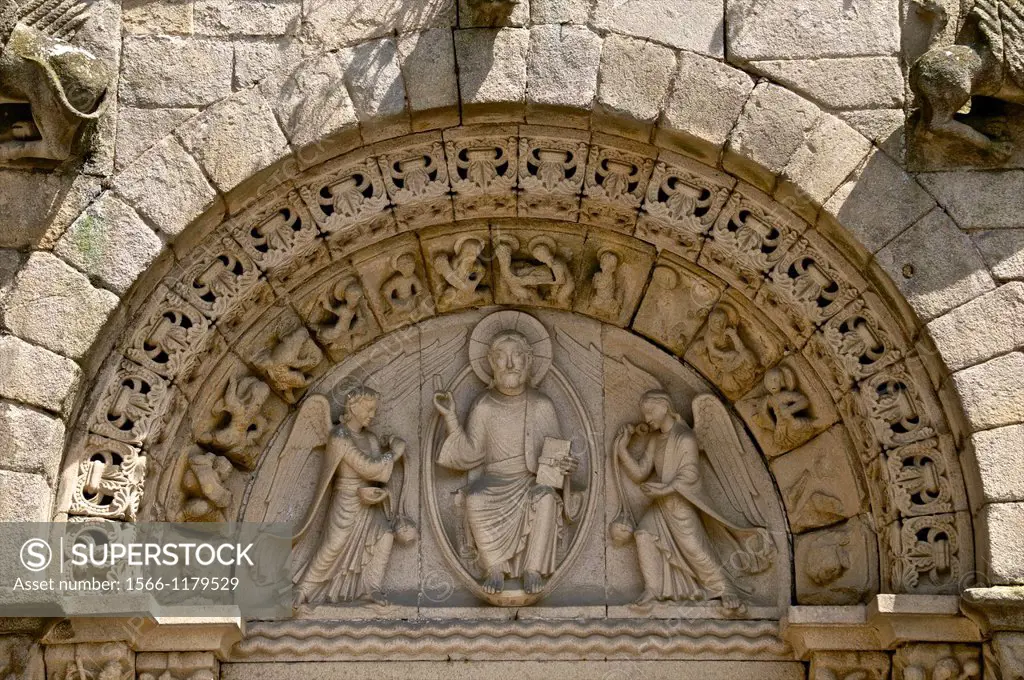 Main porch of St Sauveur Basilica 12th/15th c   detail Crist in majesty with 2 angels exterior Tomb of the heart of Dugesclin