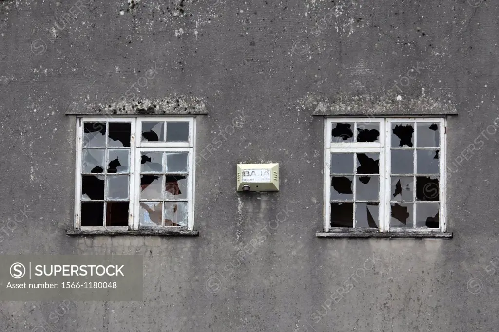 broken windows on derelict property in wales, great britain, uk