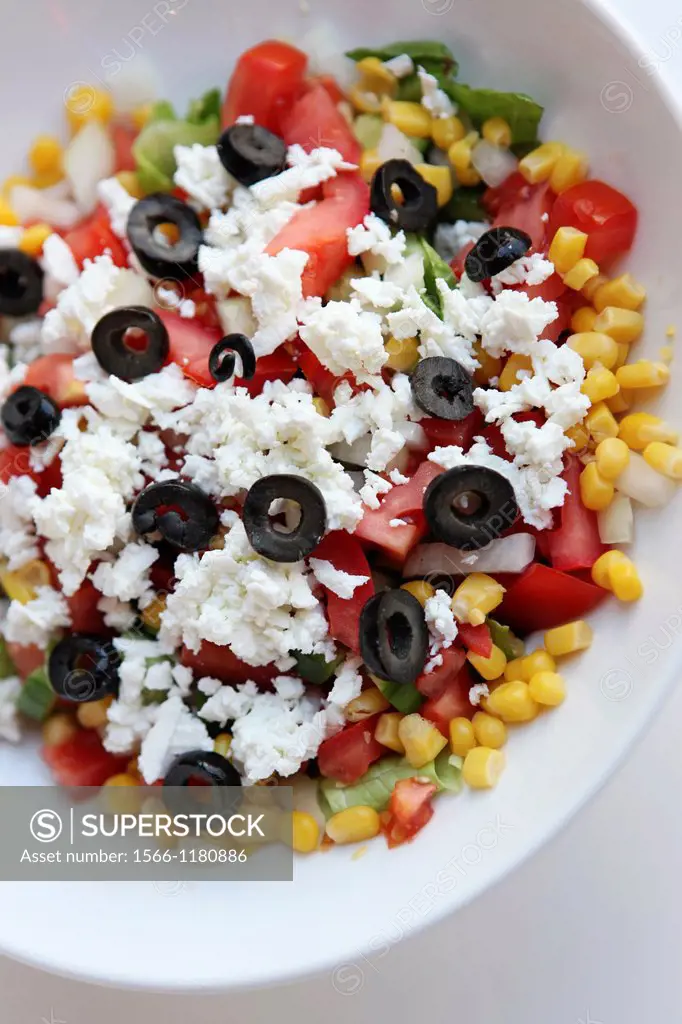Fresh Greek Salad with tomato, cucumber, feta cheese and black olives