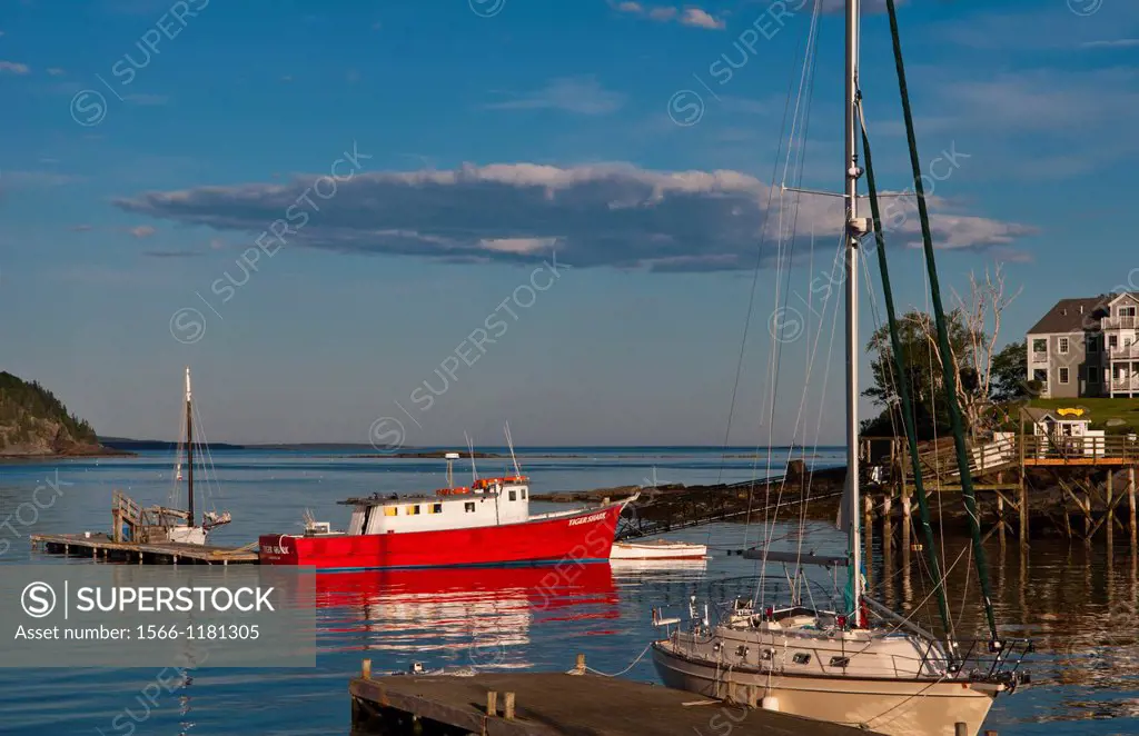 Beautiful vacation spot of Bar Harbor Maine with water and ships, boats and great sky