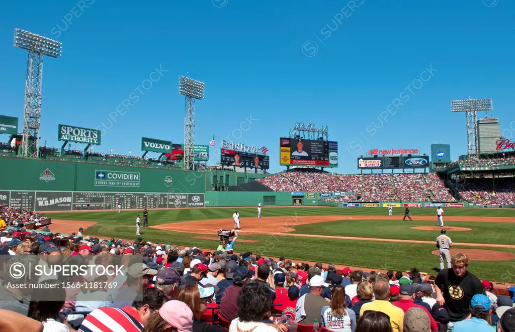 Great daytime professional baseball game at famous historical Fenway Park in Boston with Green Monster in left field Red Sox Nation