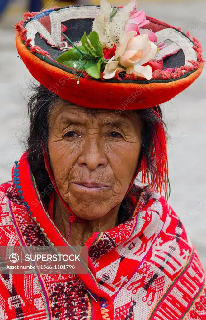 Portrait of older lady with traditional dress in small town of Pisaq Peru South America