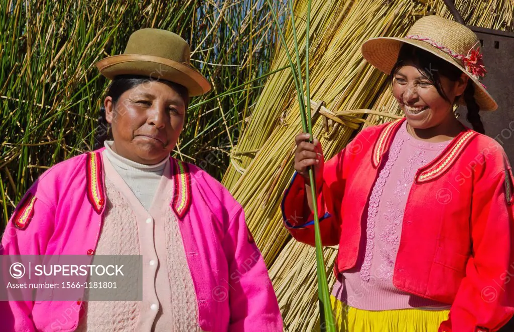 Portrait of young woman in Uros family on floating islands of Lake Titicaca in Puno Peru