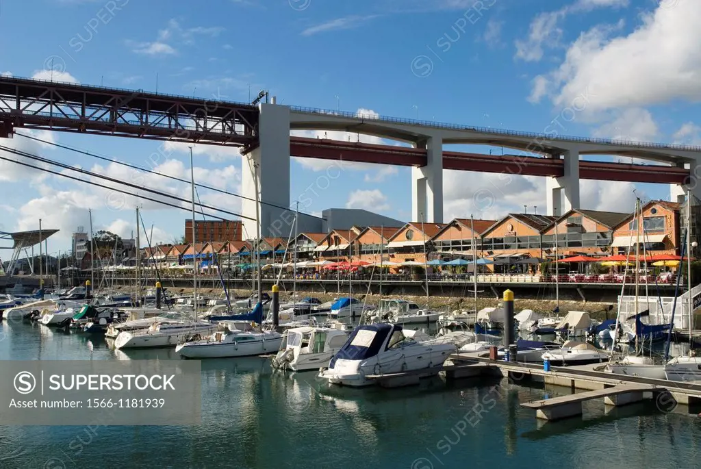 The Docks, the upscale commercial and retail district of the harbour area of Alcantara, under the 25 de Abril Bridge, Lisbon, portugal, europe