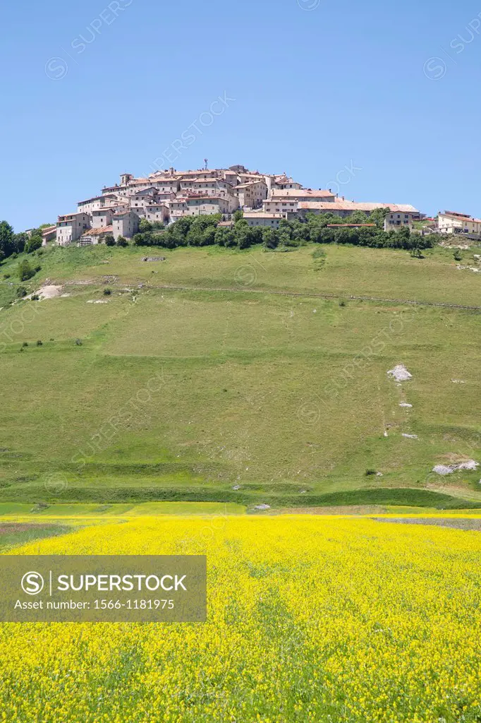 landscape wiyh the village of castelluccio di norcia, umbria, italy, europe