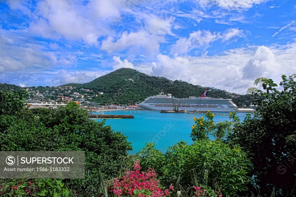 St Thomas in capital of Charlotte Amalie view from mountain showing ocean bay and Carnival Cruise Liberty at port