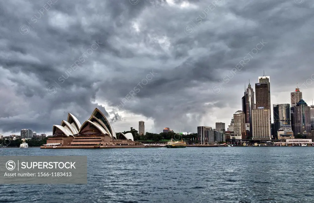 Beautiful downtown Sydney Australia with Opera House with clouds at twilight office skyline in New South Wales