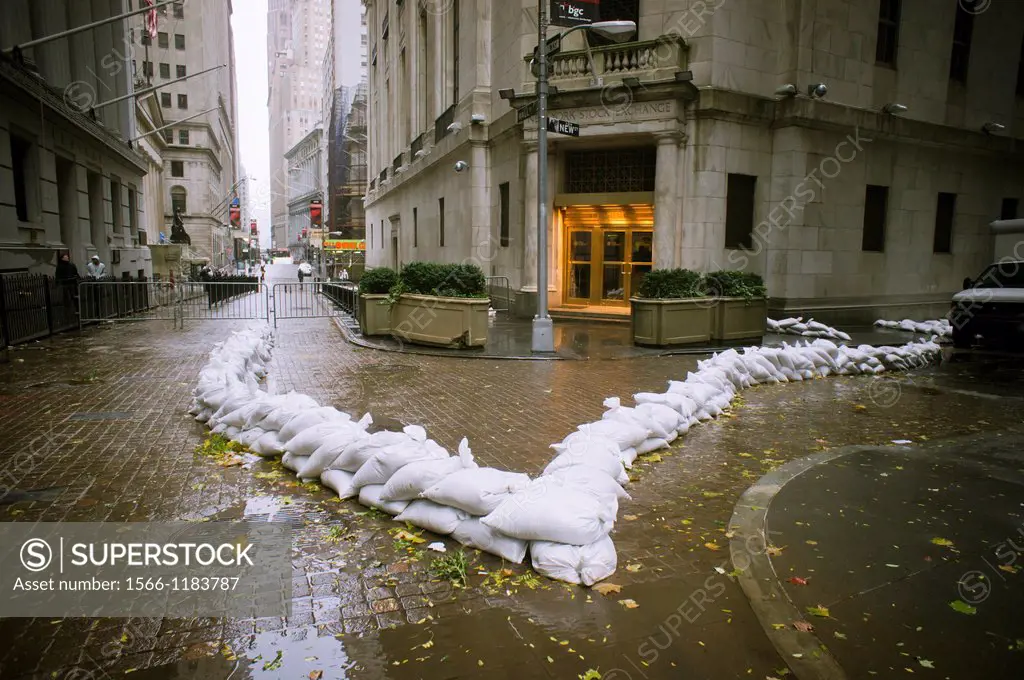 Sandbags are used to protect the entrance to the closed New York Stock Exchange in New York Hurricane Sandy continues its steady advance with heavy wi...