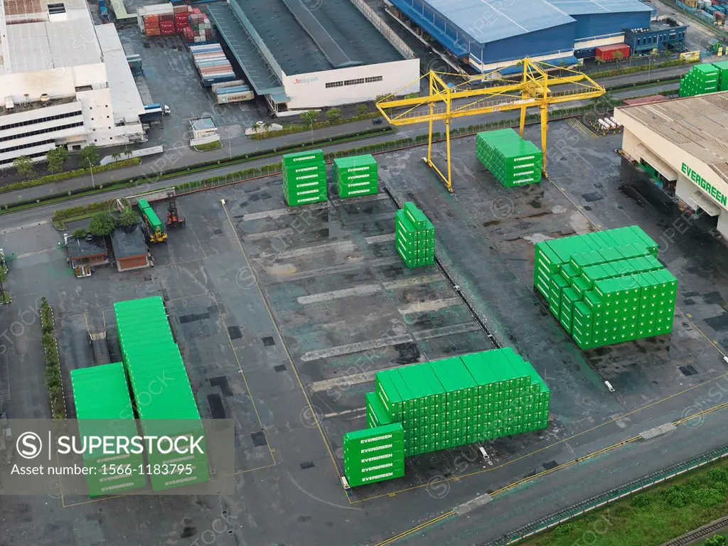 Stacks of green shipping containers at the Evergreen Shipping Terminal in Johor