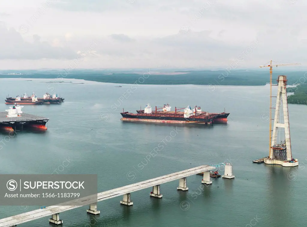 Huge transport ship carrying parts and supplies for construction of Sungai Johor Bridge, which opened on June 10, 2011 as the longest River bridge in ...