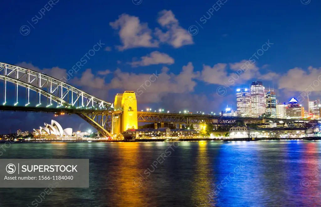 Twilight night exposure of color and great light of Famous Opera House and Harbour Bridge at skyline of Sydney Australia in New South Wales