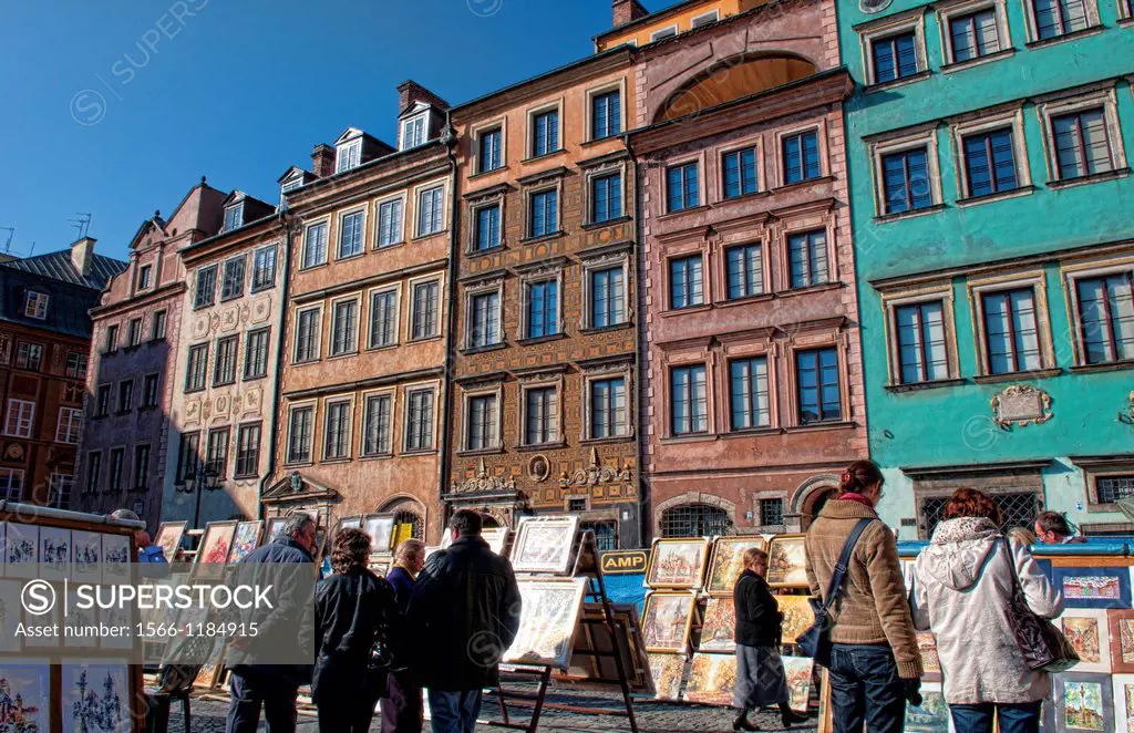 Artwork for sale and colorful architecture and beauty of Main Old Town Main Square Warsaw Poland