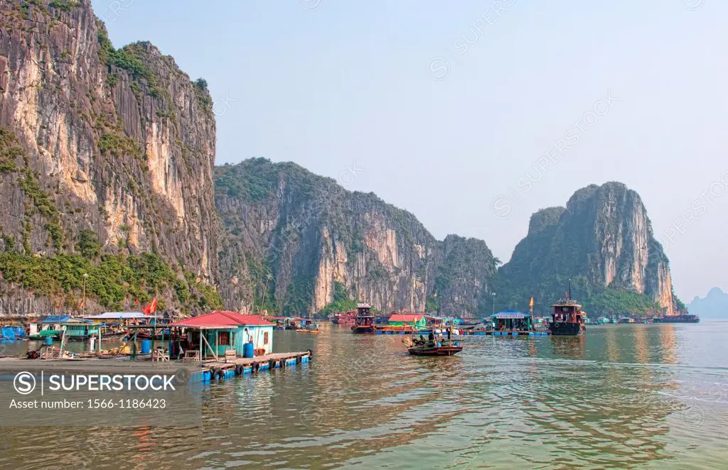 Old Boats and junkets Halong Bay Ha Long at ragged peaks and fishing villages mountains relax Vietnam