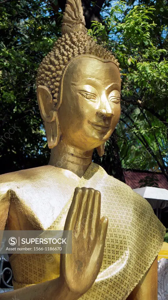Golden Buddha statue Wat Si Muang Vientiane Laos PDR