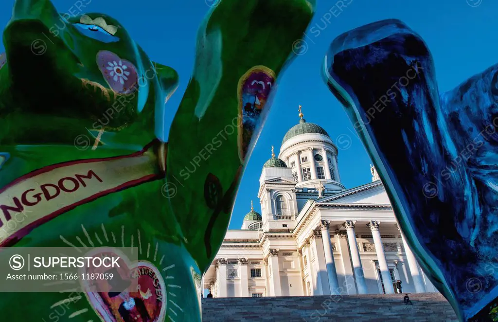 Helsinki Finland beautiful white famous Tuomiokirkko Cathedral stone church with UN Buddy Bears Project in front