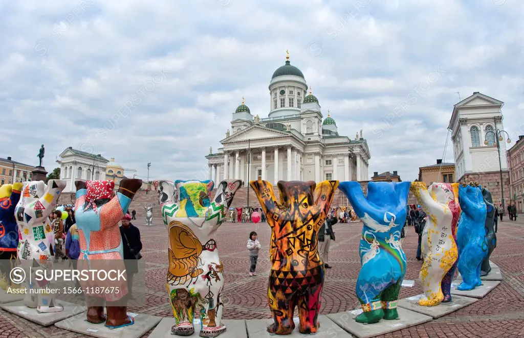 Helsinki Finland beautiful white famous Tuomiokirkko Cathedral stone church with Buddy Bears UN Project in square