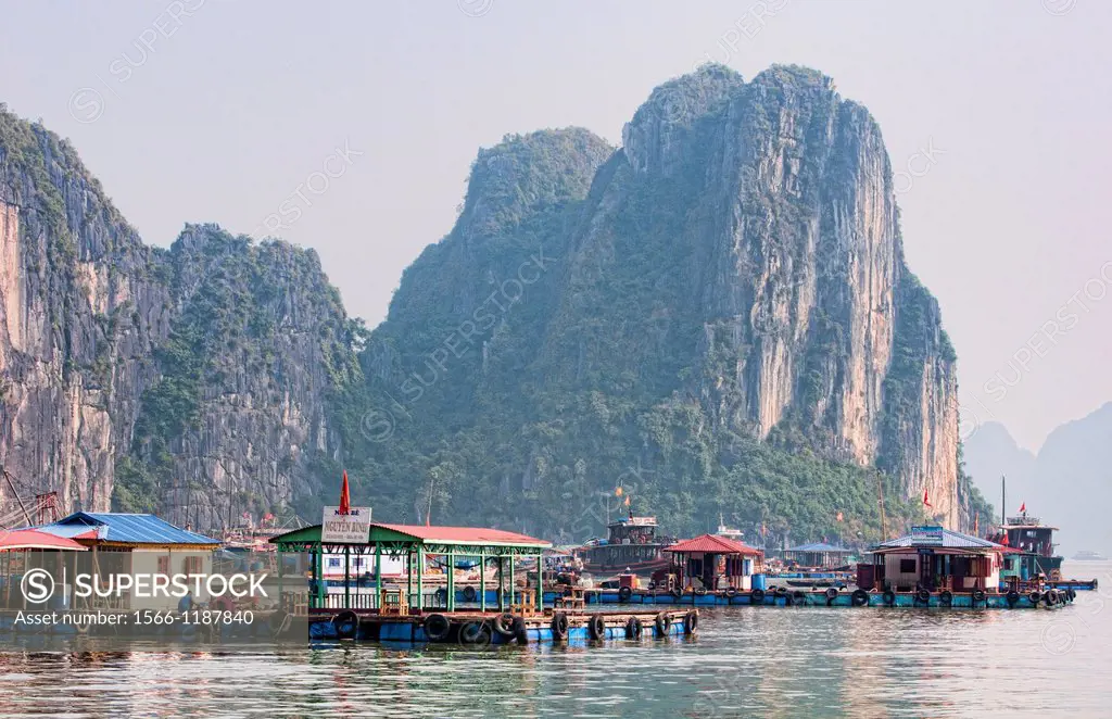 Old Boats and junkets Halong Bay Ha Long at ragged peaks and fishing villages mountains relax Vietnam