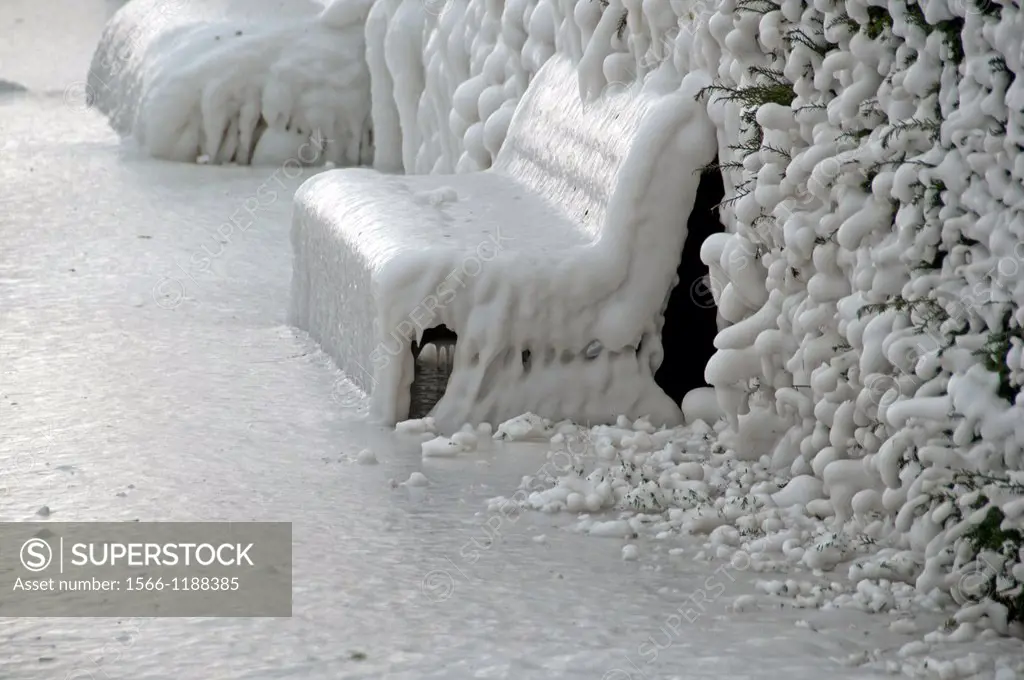 Severe winter, completely frozen benches covered with ice, Versoix, canton of Geneva, Lake Geneva region, Lake Geneva shore, Switzerland, water was bl...
