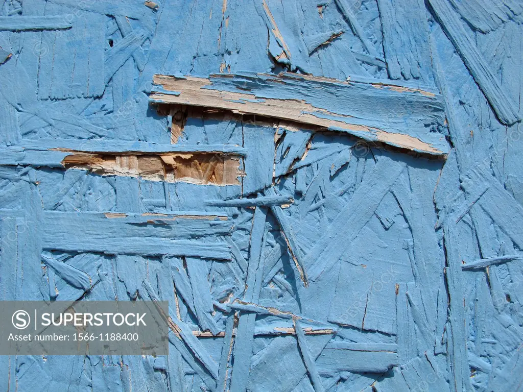 chipboard wall with blue paint