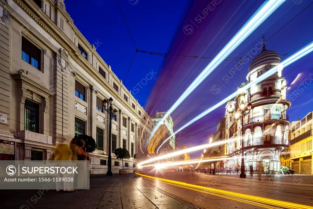 Light trails of a streetcar on Constitution Avenue, Seville, Spain