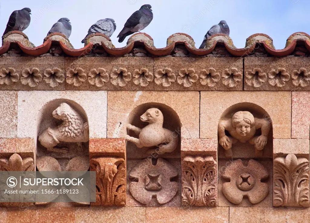Pigeons and sculpture details, Basilica de San Vicente, Avila, Spain.